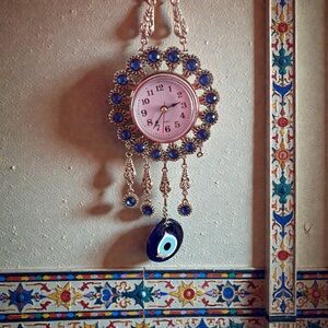 Elegant Gold and Blue Wall Clock with Evil Eye Pendant from Belize